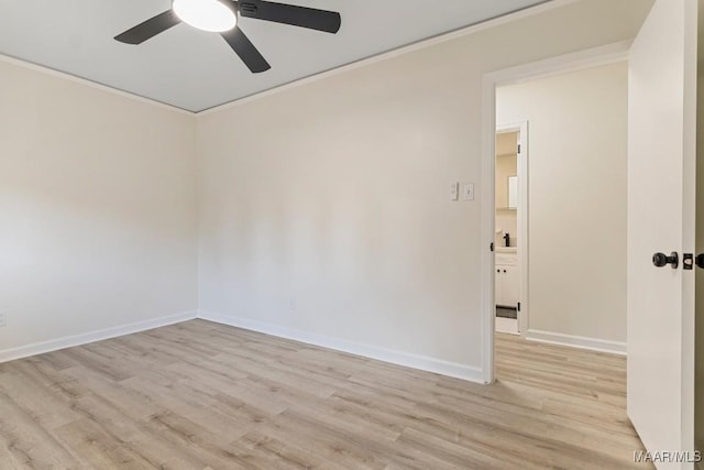 unfurnished room with crown molding, ceiling fan, and light hardwood / wood-style flooring