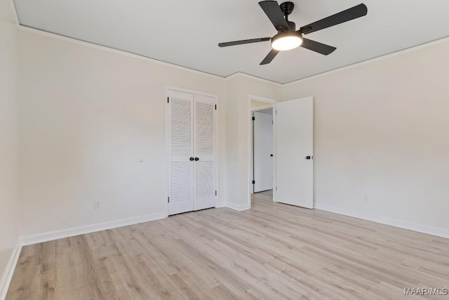 spare room with crown molding, ceiling fan, and light hardwood / wood-style flooring