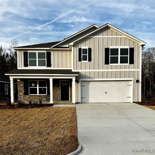 view of front of house with a garage and central air condition unit