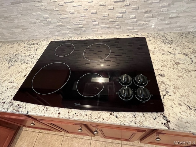 room details with black electric cooktop