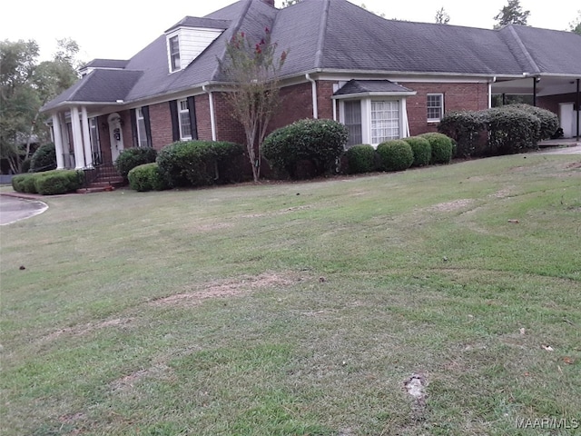 view of home's exterior featuring a lawn