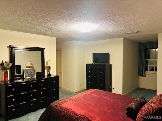 carpeted bedroom with a textured ceiling