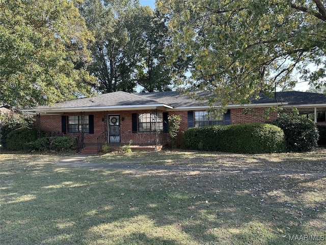 single story home with a front yard