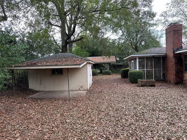 225 Merrimac Dr, Selma, AL 36701 - view of outdoor structure with a sunroom