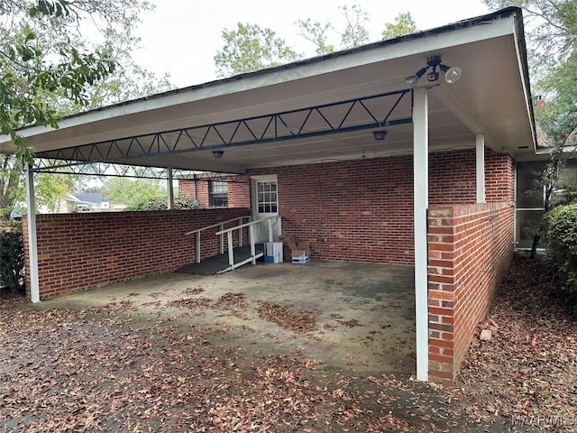 view of vehicle parking featuring a carport