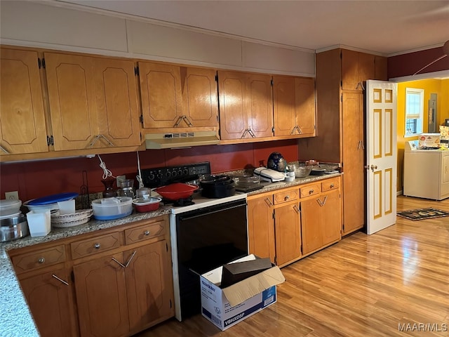 kitchen featuring light wood-type flooring, ornamental molding, electric stove, washer / dryer, and range hood