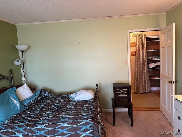 225 Merrimac Dr, Selma, AL 36701 - bedroom with crown molding, light colored carpet, baseboards, and a textured ceiling