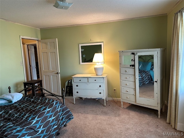 carpeted bedroom featuring a textured ceiling and ornamental molding