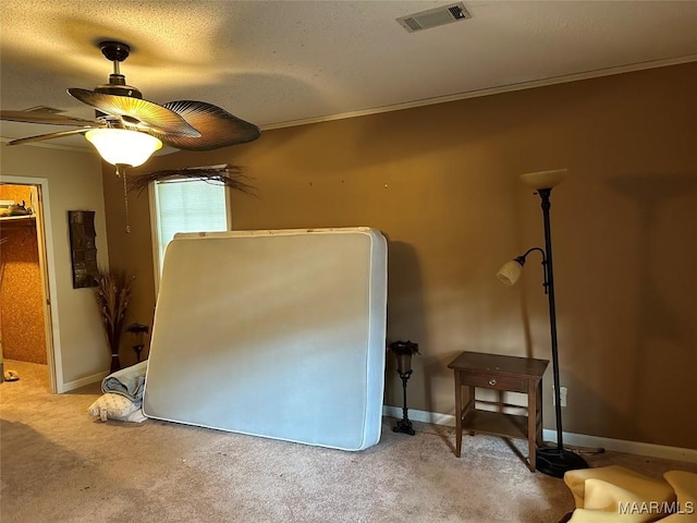 225 Merrimac Dr, Selma, AL 36701 - bedroom featuring carpet flooring, ornamental molding, ceiling fan, baseboards, and a textured ceiling