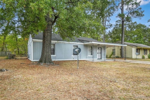 170 W S Blvd, Montgomery, AL 36105 - view of front of house with an attached carport, concrete driveway, and a front yard