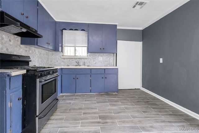 kitchen featuring gas stove, blue cabinets, sink, and crown molding