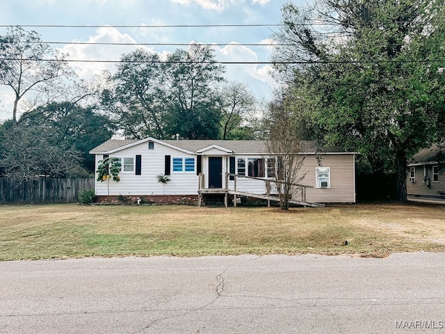 view of front facade with a front yard