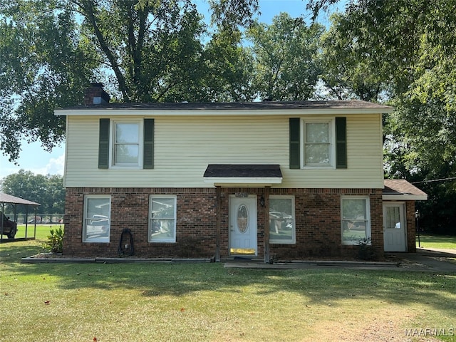 view of front of house with a front yard