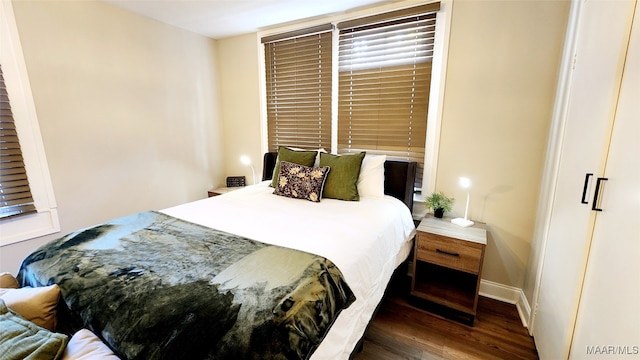 bedroom featuring dark hardwood / wood-style floors