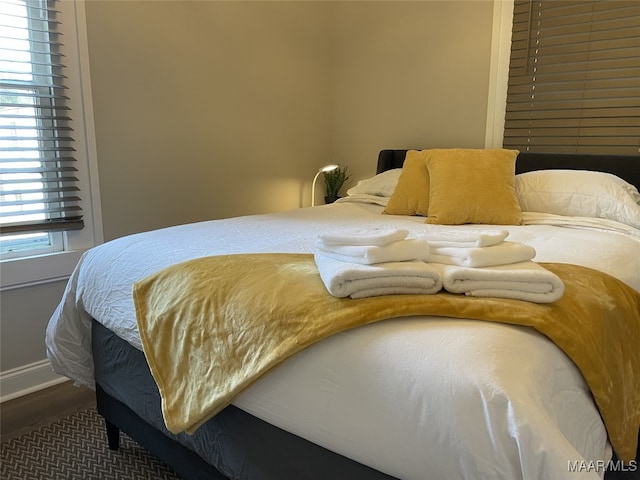 bedroom featuring wood-type flooring