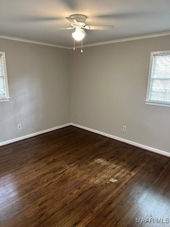 unfurnished room featuring ornamental molding, dark hardwood / wood-style floors, and ceiling fan