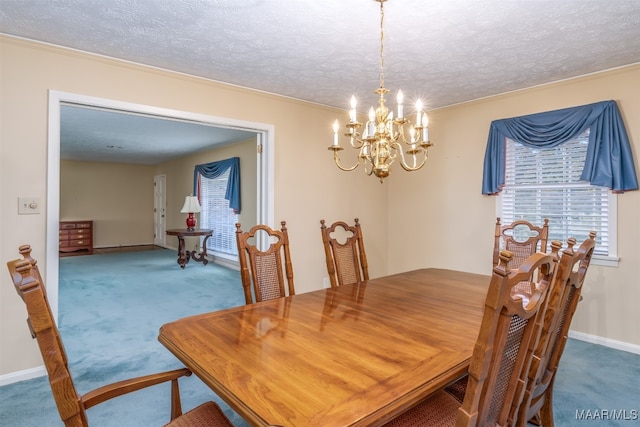 carpeted dining room with a notable chandelier, a textured ceiling, and crown molding