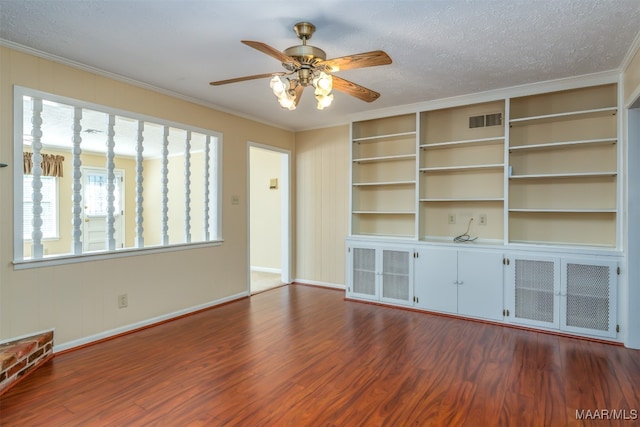 unfurnished living room with radiator heating unit, crown molding, a textured ceiling, hardwood / wood-style flooring, and ceiling fan