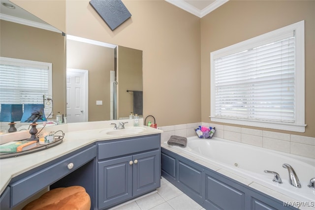 bathroom with tile patterned flooring, vanity, a bathtub, and ornamental molding