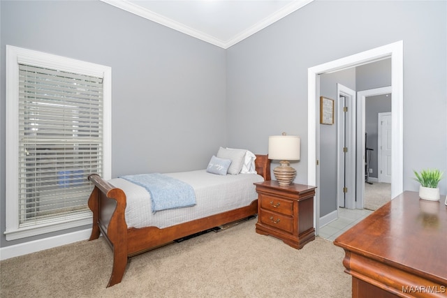 carpeted bedroom featuring ornamental molding