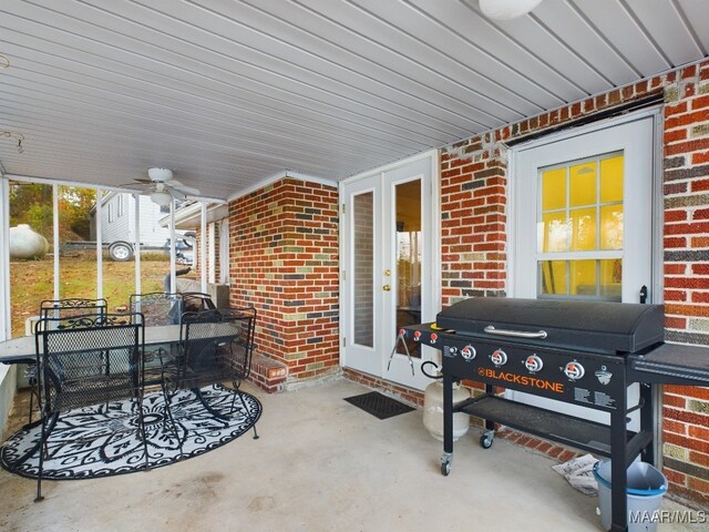 983 Lake Haven Dr, Deatsville, AL 36022 - view of patio / terrace with outdoor dining space, ceiling fan, and a grill