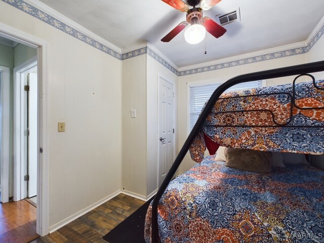 983 Lake Haven Dr, Deatsville, AL 36022 - bedroom featuring wood finished floors, ceiling fan, and ornamental molding