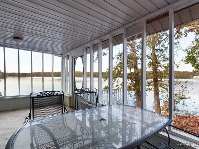 983 Lake Haven Dr, Deatsville, AL 36022 - unfurnished sunroom with a water view and outdoor dining space