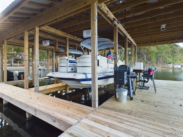 dock area featuring a water view