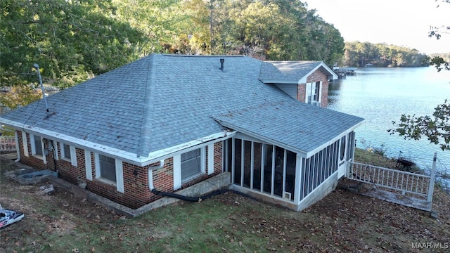 983 Lake Haven Dr, Deatsville, AL 36022 - view of subject property with a nearby body of water and a forest