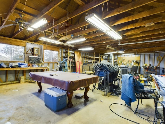 recreation room featuring concrete flooring, a workshop area, ceiling fan, and billiards