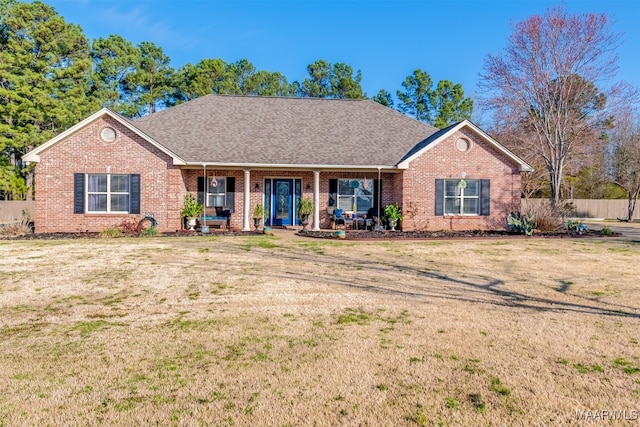 ranch-style home with a front yard