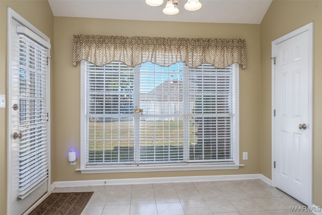 entryway featuring light tile patterned flooring