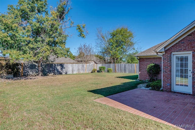 view of yard with a patio area