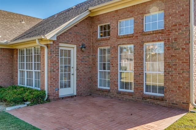 entrance to property with a patio area