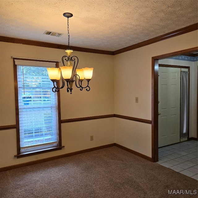 unfurnished room with carpet flooring, a textured ceiling, and ornamental molding