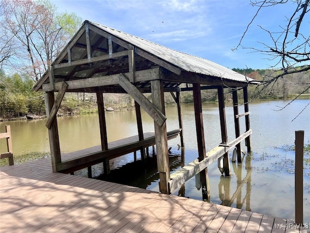 view of dock with a water view