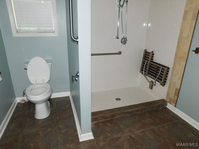 bathroom featuring toilet, radiator heating unit, and a shower