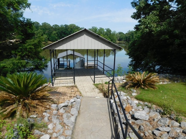 exterior space with a water view