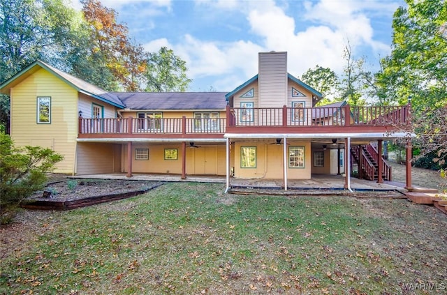 171 Griffith Ln, Tallassee, AL 36078 - rear view of house with a ceiling fan, a patio, a deck, stairs, and a yard
