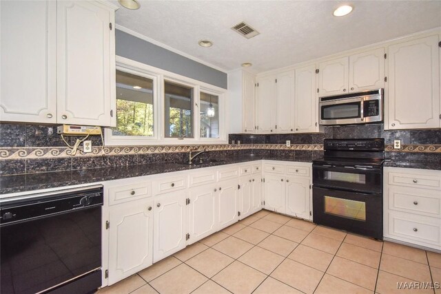 171 Griffith Ln, Tallassee, AL 36078 - kitchen featuring black appliances, white cabinetry, dark countertops, crown molding, and light tile patterned flooring