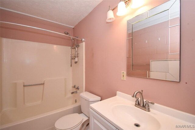 171 Griffith Ln, Tallassee, AL 36078 - full bathroom with toilet, vanity, a textured ceiling, and shower / washtub combination