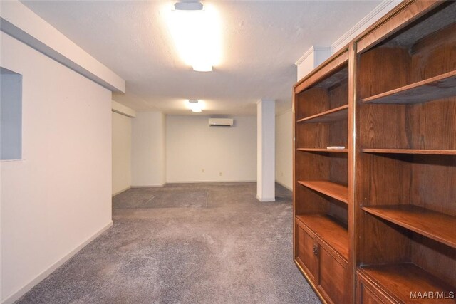 171 Griffith Ln, Tallassee, AL 36078 - finished below grade area with a wall unit AC, carpet floors, and baseboards