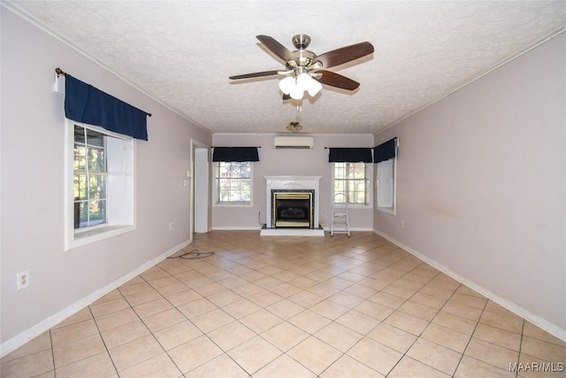 171 Griffith Ln, Tallassee, AL 36078 - unfurnished living room with a wall mounted air conditioner, a textured ceiling, a premium fireplace, ornamental molding, and a ceiling fan