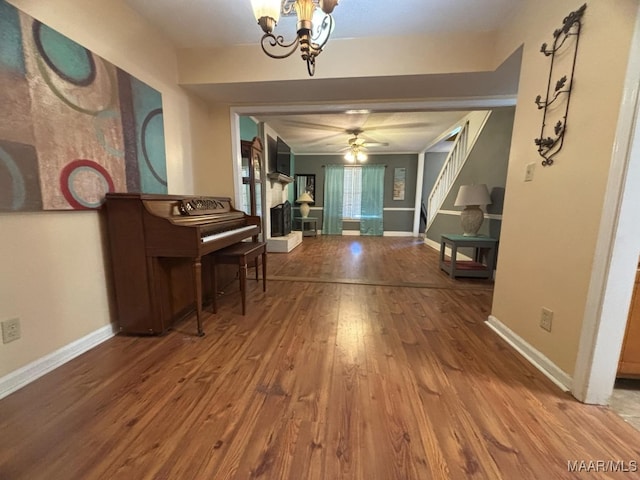 interior space featuring an inviting chandelier and wood-type flooring