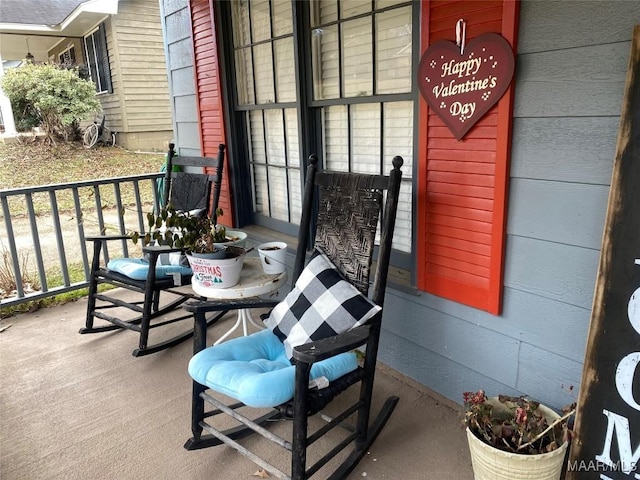 doorway to property featuring covered porch