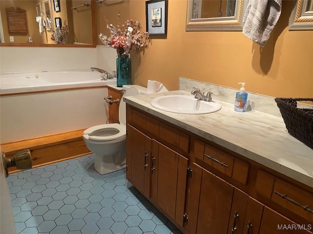 bathroom featuring a tub to relax in, tile patterned floors, toilet, and vanity