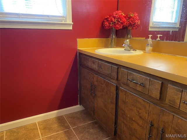 bathroom featuring tile patterned floors and vanity