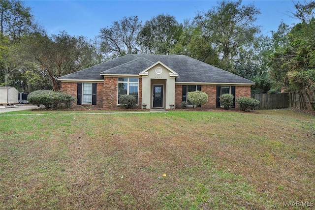 ranch-style home with a front yard