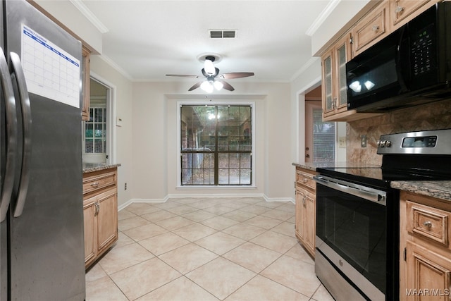 kitchen with light stone countertops, crown molding, and appliances with stainless steel finishes