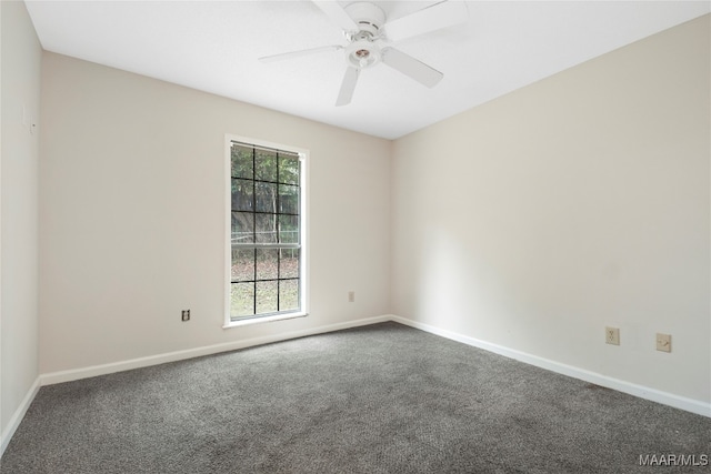 carpeted empty room with ceiling fan